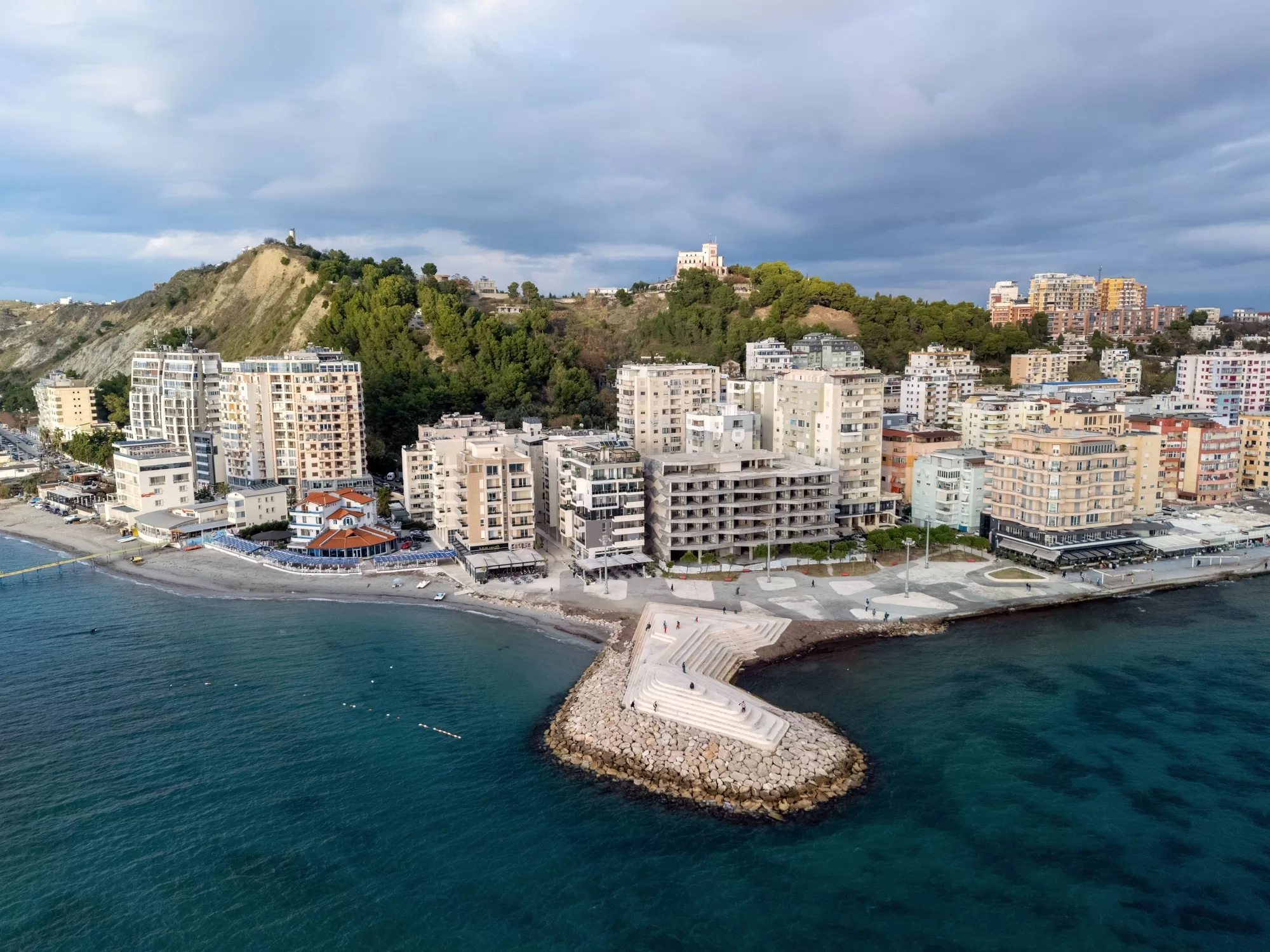 Aerial view of the coastal cityscape with modern buildings by the sea in Durres, Albania