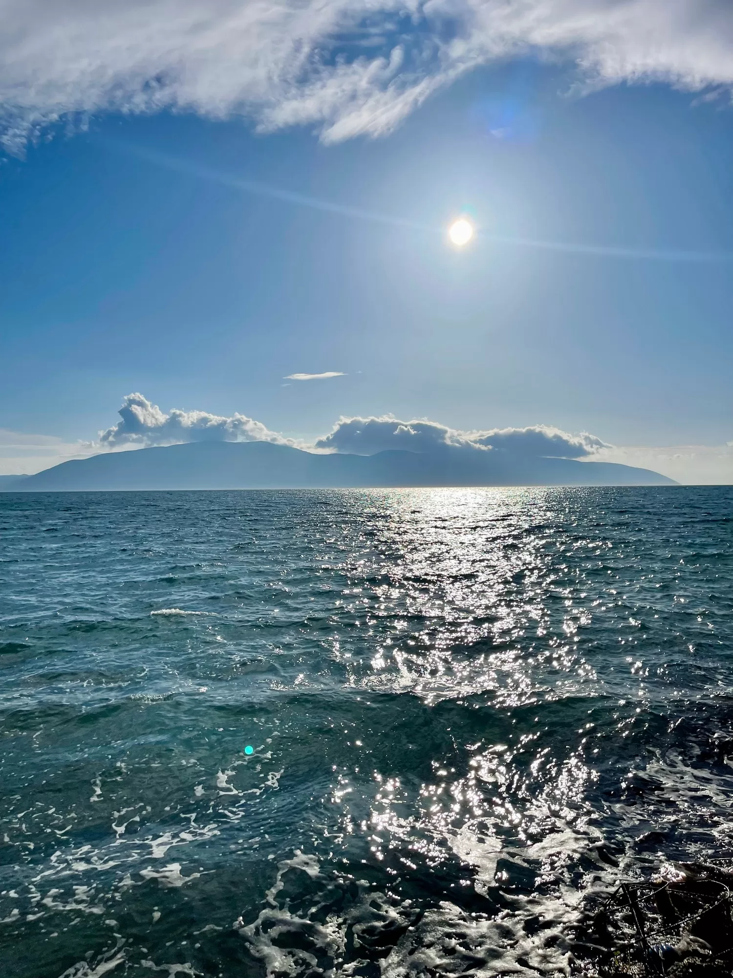 Scenic sunset over Ioninan sea in Vlore Albania. Vertical photo.